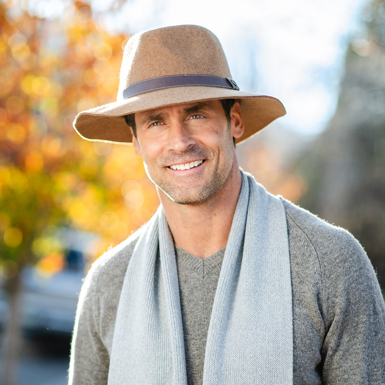 Man wearing a wool-felt style winter sun hat by Wallaroo
