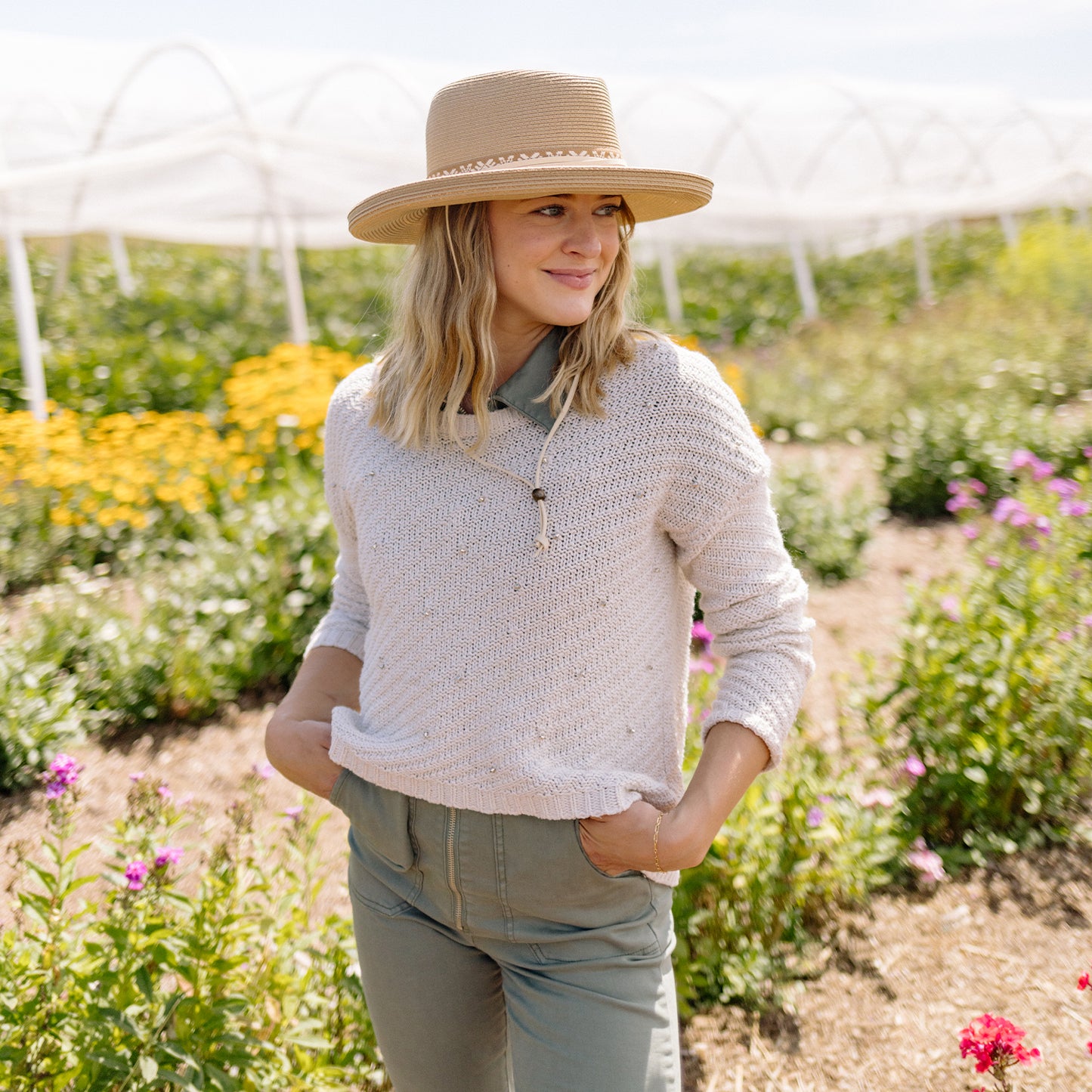 woman wearing a wide brim sun hat by Wallaroo, Camel