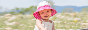 Child wearing UPF Bucket Style Sun Hat by Wallaroo