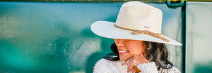 Woman outside wearing Women's Wallaroo fedora style sun hat