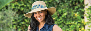 Woman wearing the Sausalito Wide Brim sun hat by Wallaroo