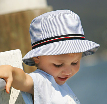 Unisex Kids Bucket Boone sun hat by Wallaroo, featuring a casual playful style, UV protection, and travel-friendly, lightweight construction, spf 50, Blue Stripes