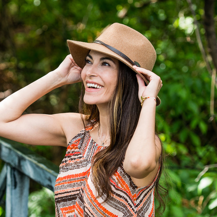 Woman wearing a Camel winter sun hat outside by Wallaroo