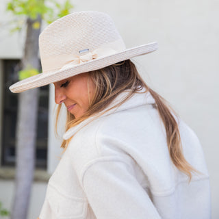 Woman in fall/winter clothing wearing a fashionable sun hat by wallaroo