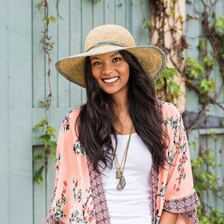 Wallaroo Women's Camille Turquoise Raffia Sun Hat with a fashionable design and adjustable fit. Perfect for brunches, outdoor weddings, and sunny days with effortless style and comfort.