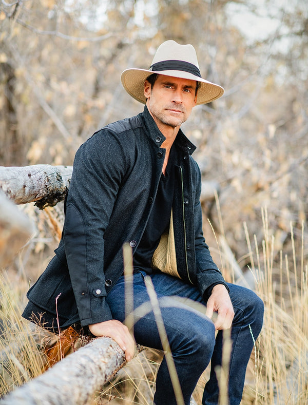 Man wearing a big wide brim sun hat by Carkella