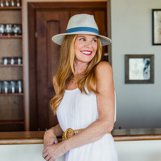 Woman wearing a Ladies' fedora sun hat in a summer dress by Wallaroo, Ivory/Dusty Blue