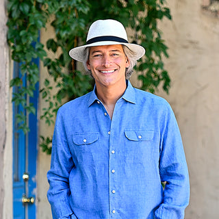 Man wearing a xl sun hat for both men and women with larger heads