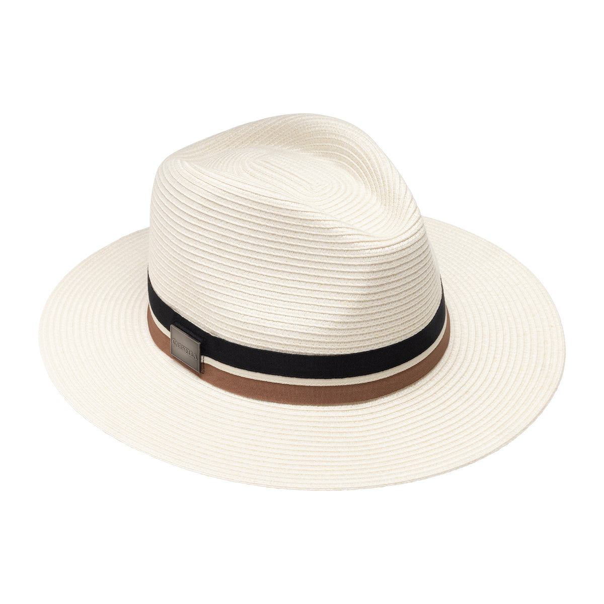 The Carkella Colin fedora hat in ivory, featuring a woven straw texture, a black and brown ribbon band with a small magnetic emblem, and a wide flat brim, isolated against a white background.