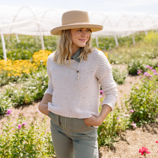 woman wearing a wide brim sun hat by Wallaroo