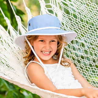 kid wearing a bucket style sun hat for children by Wallaroo, Hydrangea/White