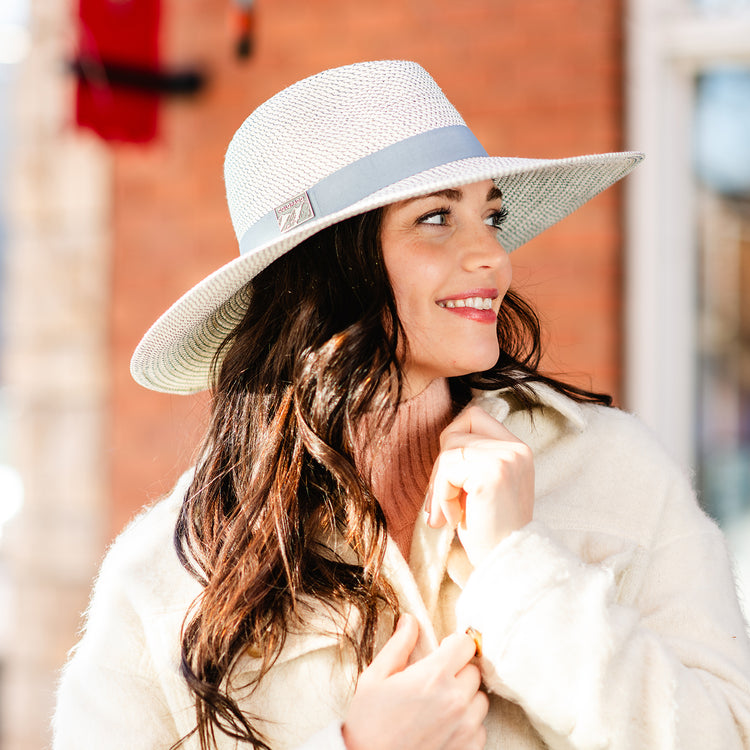 Woman in winter clothes wearing a fedora style big wide brim sun hat for  ladies, Ivory/Cloud Grey