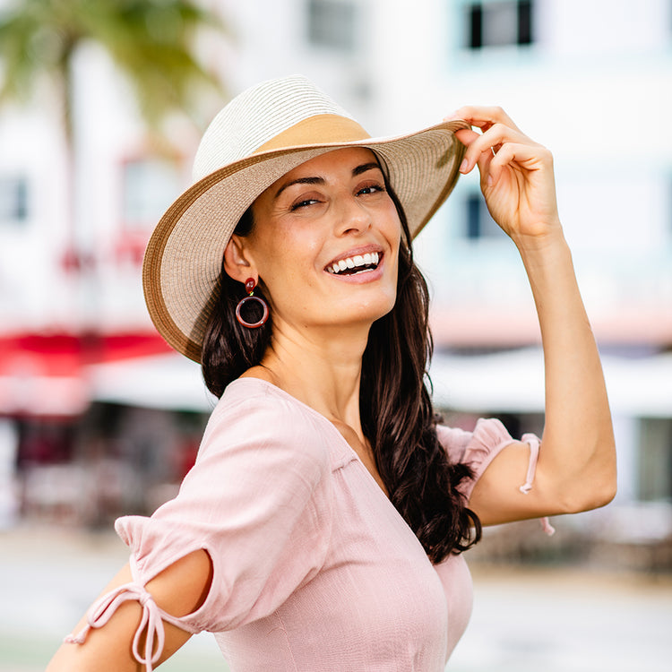 Woman wearing a wide brim summer hat by Wallaroo
