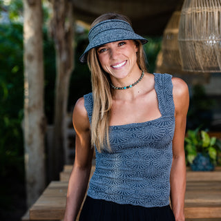 woman wearing a ladies sun visor 