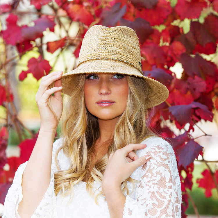 Woman Wearing a Big Wide Brim Fedora Style Malibu Straw Sun Hat from Wallaroo, Natural