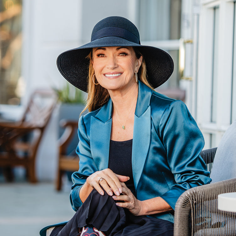 Jane Seymour making a bold statement with the Wallaroo Margot wide-brim sun hat, crafted for sun protection and urban elegance, Black