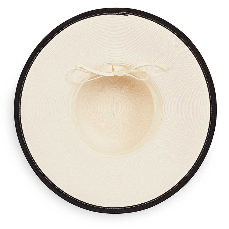 Margot sun hat by Wallaroo, featuring a big wide brim and is packable for travel