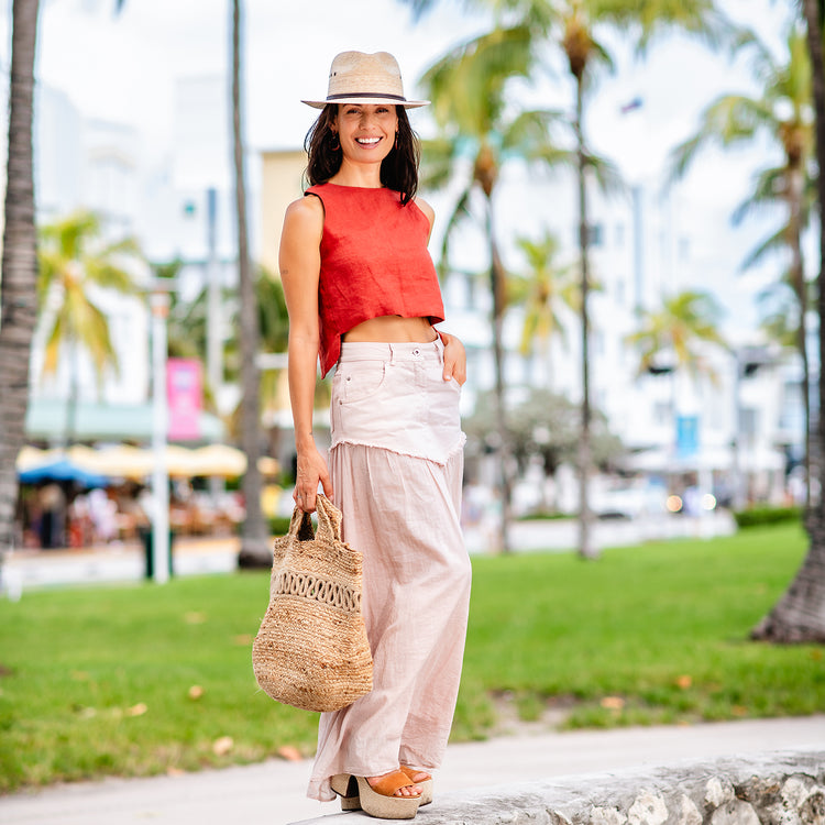 Woman wearing an artisan style fedora summer sun hat by Wallaroo, Camel