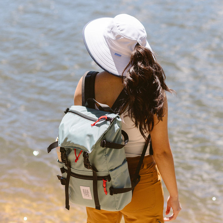 woman wearing a wide brim ponytail sun hat by Wallaroo