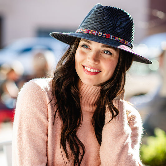 Woman wearing a fedora sedona winter sun hat by Wallaroo, Navy
