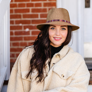 Woman wearing a fedora sedona winter sun hat by Wallaroo, Camel