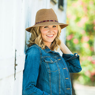 Woman outside wearing the sedona beach sun hat with UPF 50+ rating, Camel