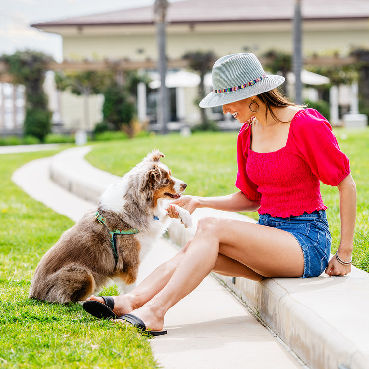 Woman wearing a UPF fedora sun hat by Wallaroo, Sage, S/M (58cm)