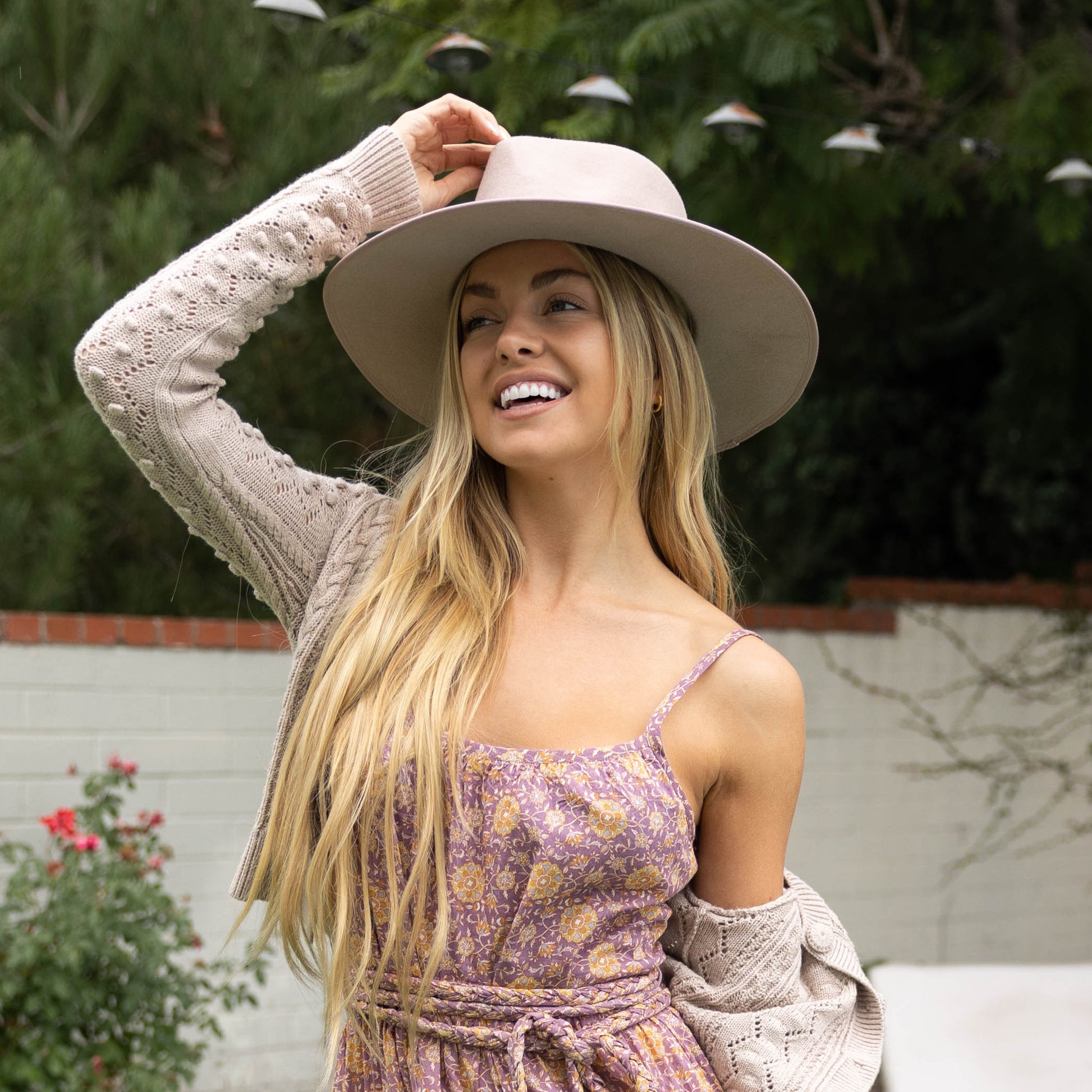 Woman wearing Sloan felt hat in spring dress, Taupe