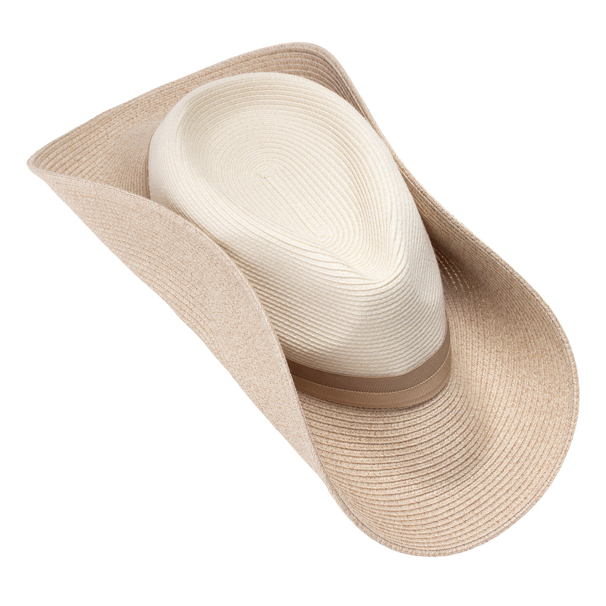 The Wallaroo Solitaire hat by Jane Seymour in mixed camel folded in half like a soft taco to demonstrate travel packing, set against a plain white background.