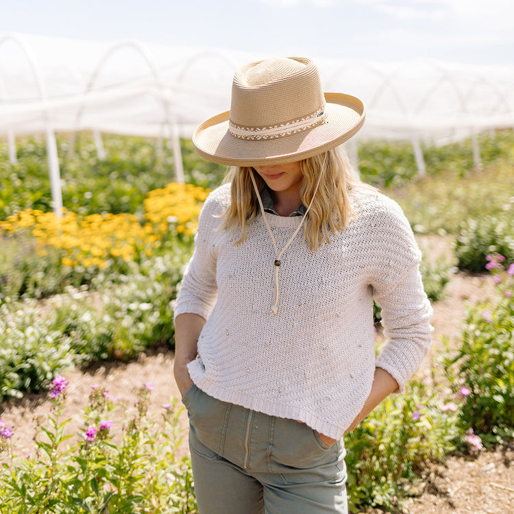 woman wearing a wide brim sun hat by Wallaroo, Camel