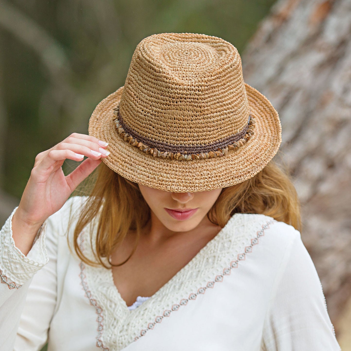Woman Wearing Tahiti Taupe Straw Sun Hat in Taupe from Wallaroo