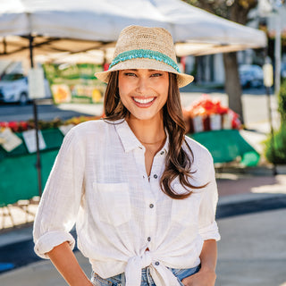 Woman Wearing Tahiti Turquoise Straw Sun Hat in Turquoise from Wallaroo