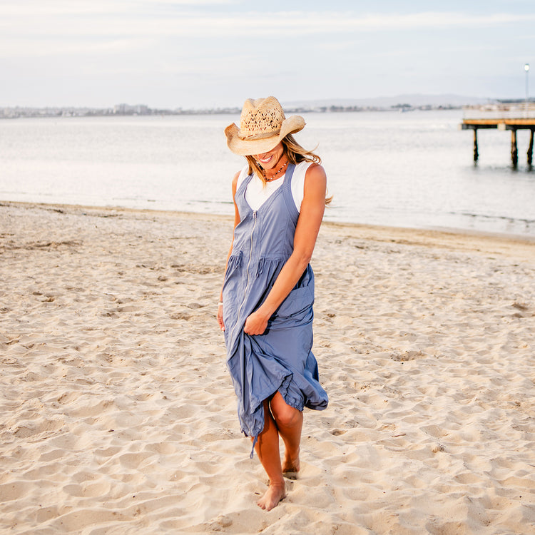 Woman Wearing an Adjustable Tina Straw Cowboy Sun Hat on the beach from Wallaroo, Natural