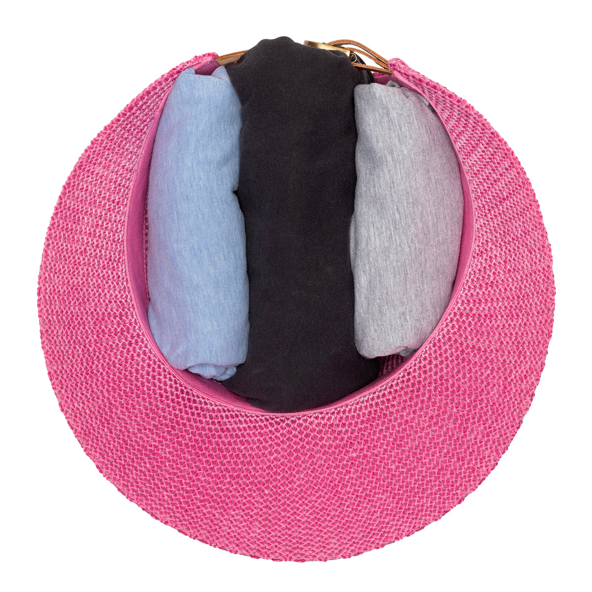Stuff it packing view of the Victoria Cap ponytail sun hat in hot pink, brown adjustable strap, shown on a white background.