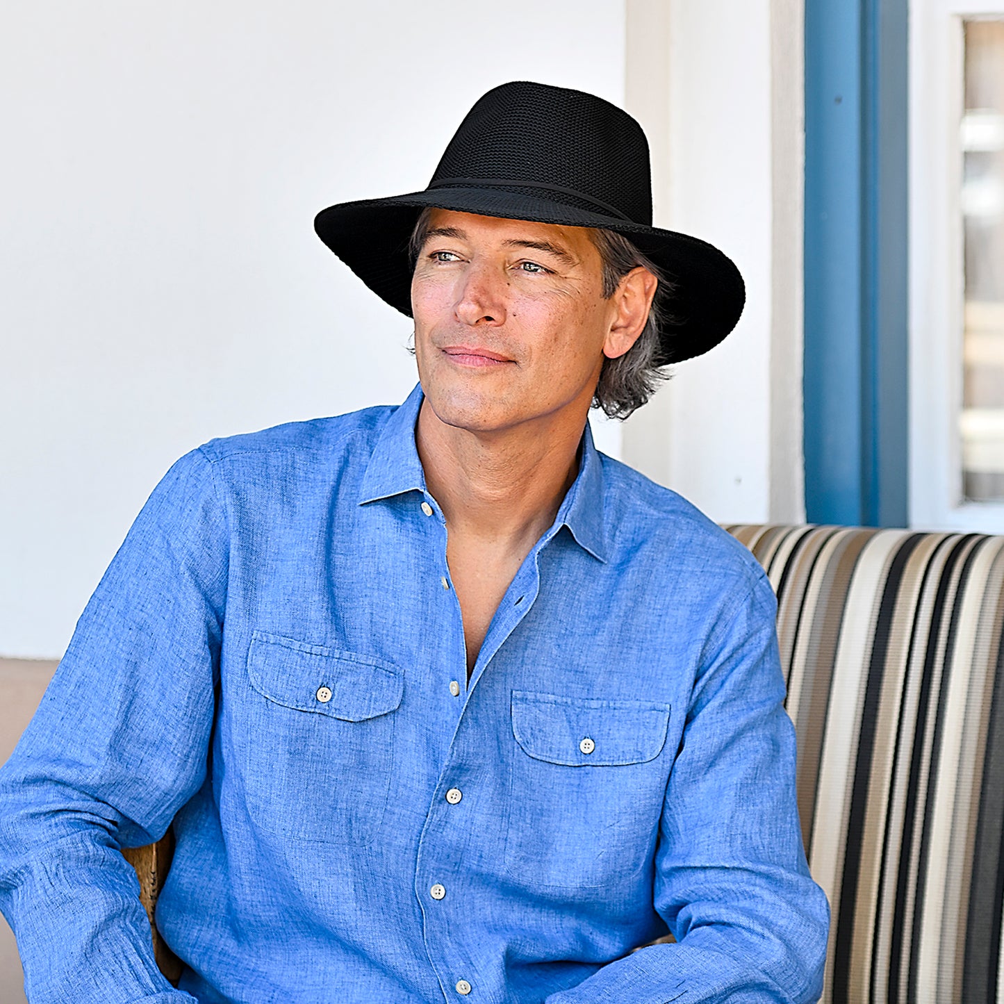 Man wearing a fedora style sun hat by Wallaroo, Black