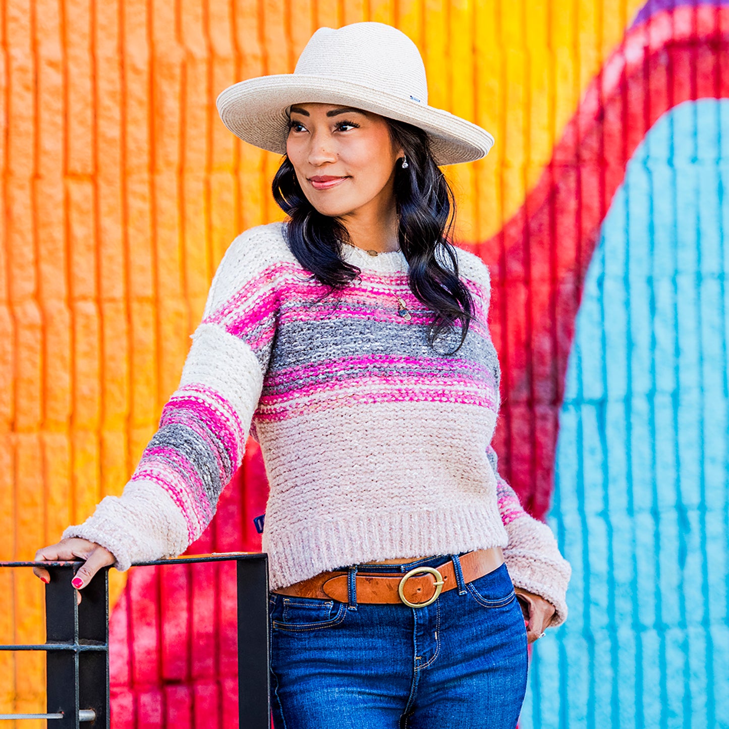 Woman Wearing a UPF Packable Big Wide Brim Fedora Style Vivian Sun Hat by Carkella, White Beige