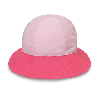 Front of Kid's UPF Packable Adjustable Wide Brim Bucket Style Sun Hat with Chinstrap in Pink from Wallaroo