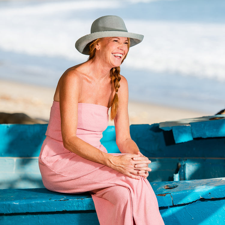 Woman Wearing Big Wide Brim Style poly straw Sun Hat in Seafoam from Wallaroo